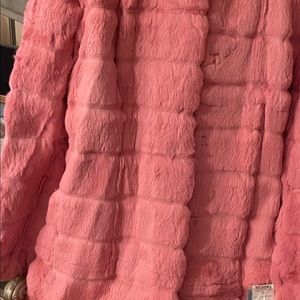I’m selling my rabbit pink fur coat never worn